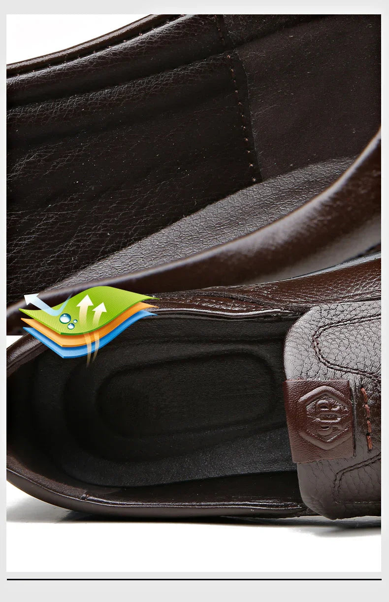 Close-up of brown leather loafers with soft cushioned insole and breathable layer graphic