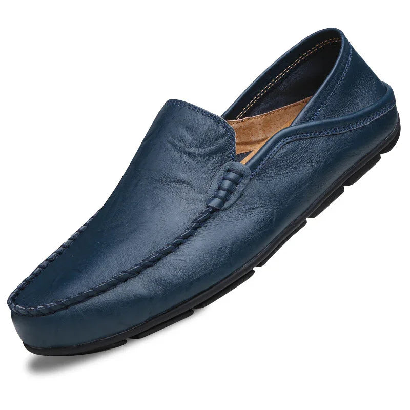 Men's navy blue leather slip-on loafer with moc toe stitching and black rubber sole