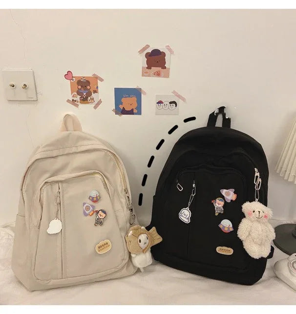 Beige and black cute backpacks with keychains and pins, kawaii wall art background