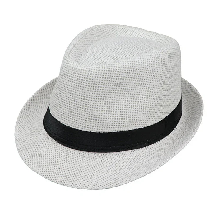 White woven fedora hat with a black band on a white background