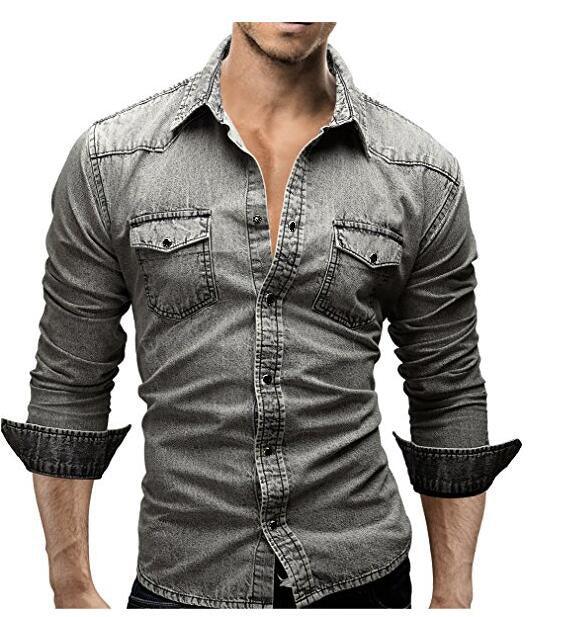 man wearing fitted grey denim shirt with rolled-up sleeves and buttoned chest pockets