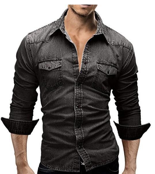 man wearing fitted black denim shirt with rolled-up sleeves and chest pockets