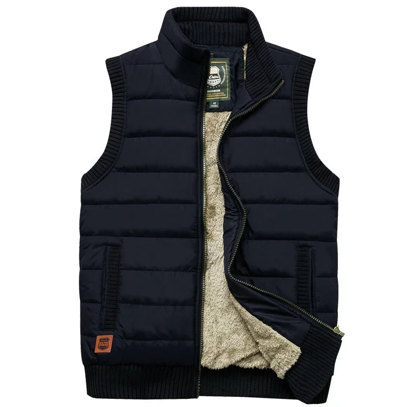 Black quilted sleeveless vest with zip front and beige soft fleece lining