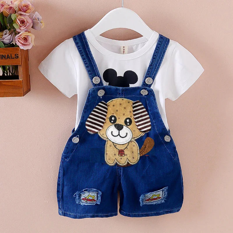 Cute baby outfit with white T-shirt and blue denim overalls featuring a cartoon dog patch
