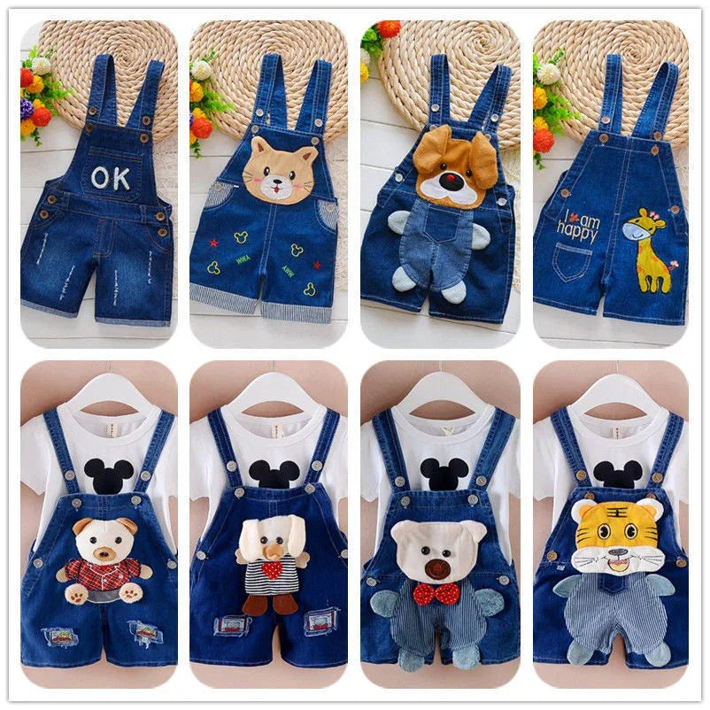 Collection of baby denim overalls with animal patches and embroidery, including cat, dog, giraffe, and teddy bear designs