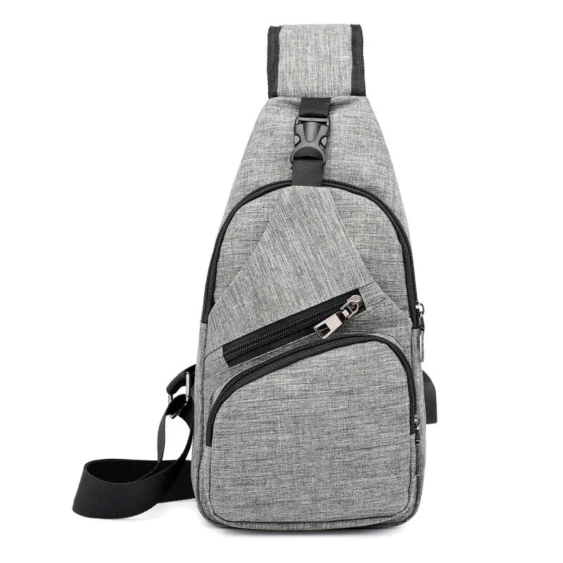 Gray crossbody sling backpack with multiple zippered pockets and adjustable black strap