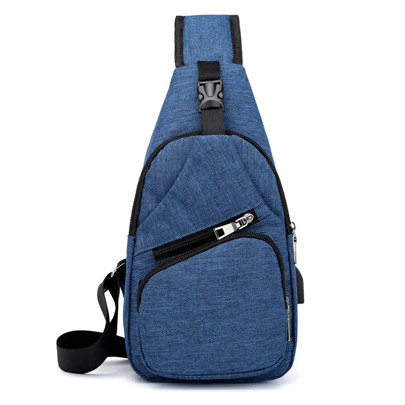 Blue crossbody sling bag with multiple zippered compartments and adjustable black strap