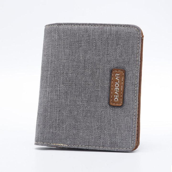 Gray fabric men's wallet with brown leather DEABOLAR logo patch on a white background