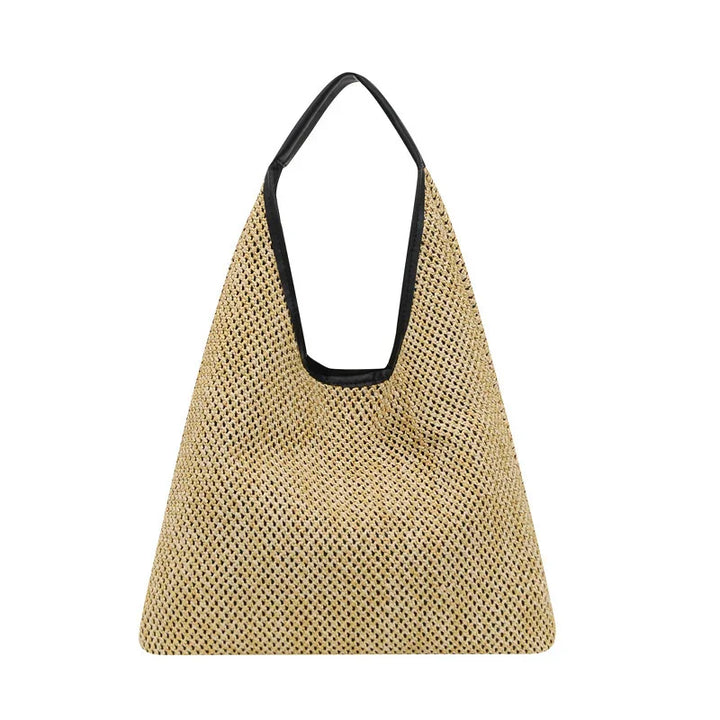 Triangle-shaped woven straw tote bag with black handle and trim on white background