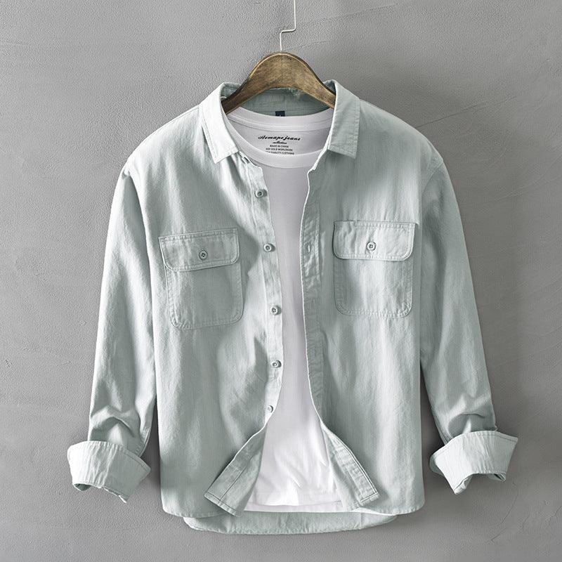 Light gray casual long sleeve shirt layered over white t-shirt on wooden hanger