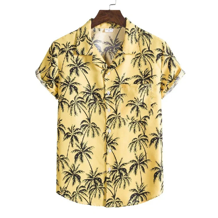 Yellow short-sleeve Hawaiian shirt with black palm tree print hanging on wooden hanger