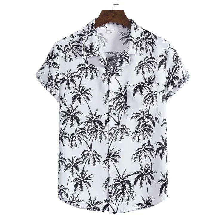 White short-sleeve button-up shirt with black palm tree print and front pocket on wooden hanger