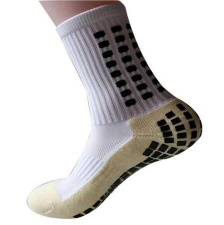 White non-slip sports sock with black rubber grips on the sole and heel