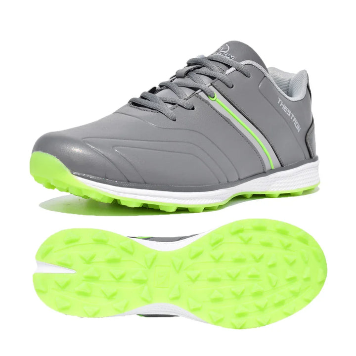 Gray sports shoe with neon green sole and accents, featuring laces and textured grip