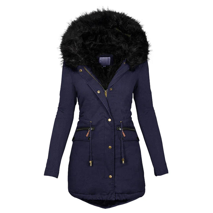 Navy blue women's winter parka with black faux fur hood and front zip pockets