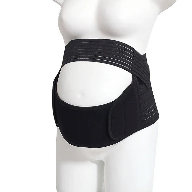 Black maternity support belt worn on mannequin for pregnancy belly support