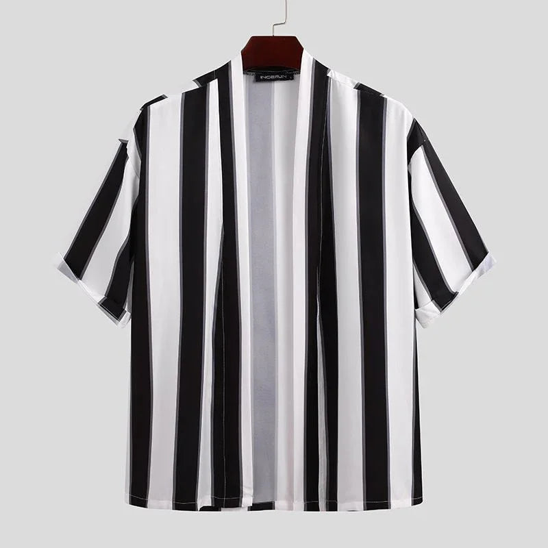 Black and white vertical striped short sleeve open front kimono jacket on hanger