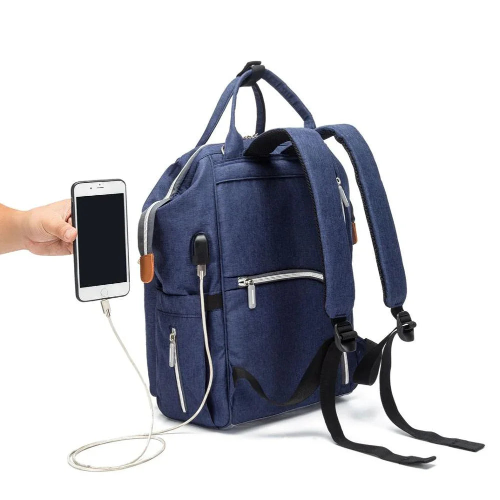 Blue backpack with USB charging port connected to a smartphone held by a hand