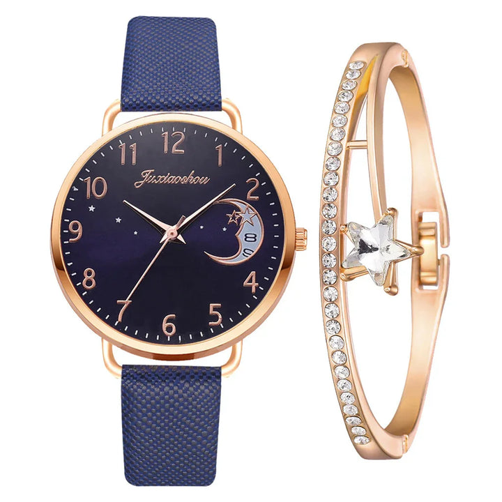 Elegant gold-tone watch with navy blue strap and moon star dial alongside crystal-studded star bracelet