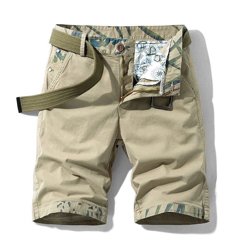 Beige casual men's shorts with patterned waistband, zipper fly, and olive green belt