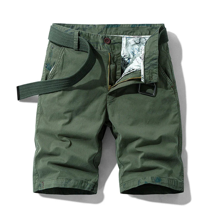Men's casual olive green shorts with belt and patterned inner lining, front zipper open