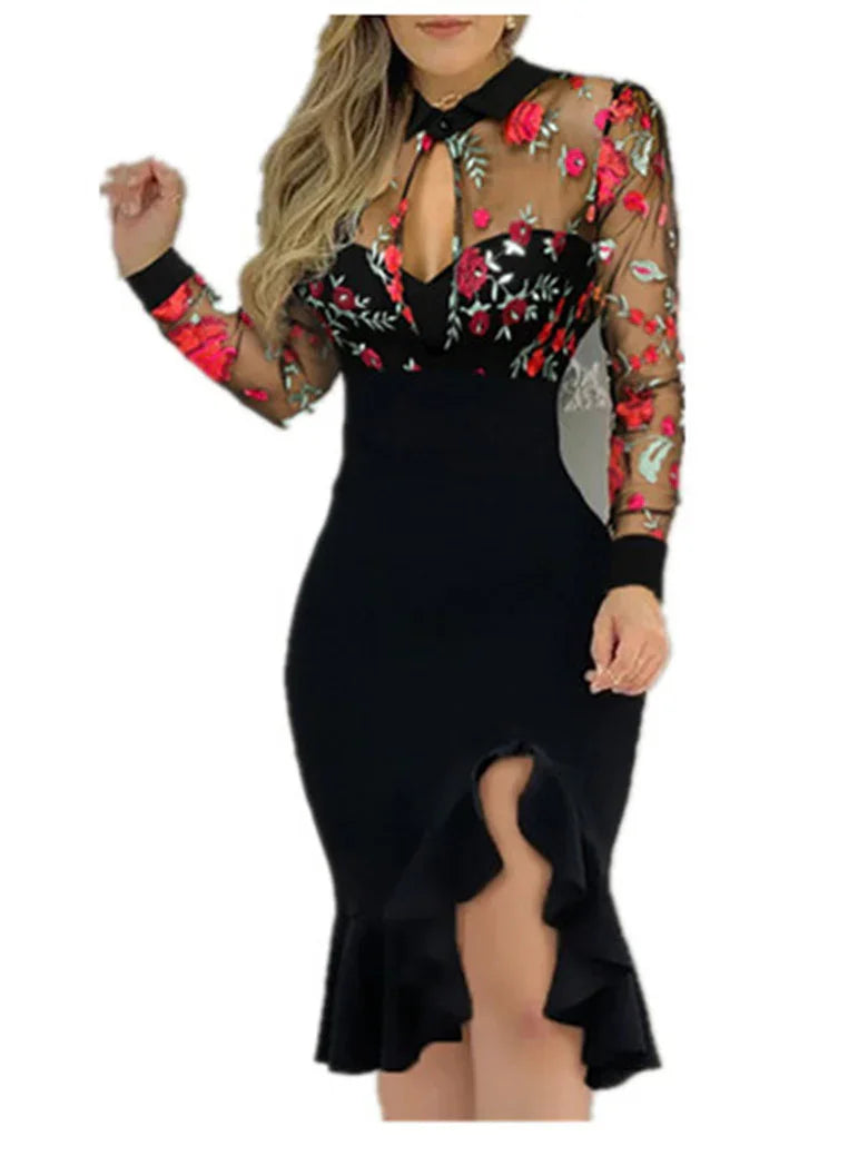 Black bodycon dress with red floral embroidered sheer sleeves and upper bodice, ruffled front slit skirt