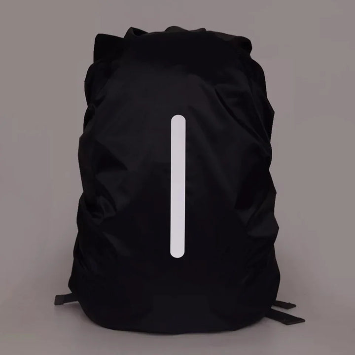 Black backpack with reflective vertical stripe on plain grey background