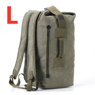 Large olive green canvas backpack with zippers, adjustable straps, and side handle against white background