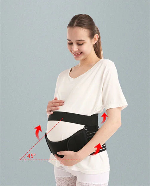 Pregnant woman wearing black maternity support belt demonstrating 45-degree belly lift angle