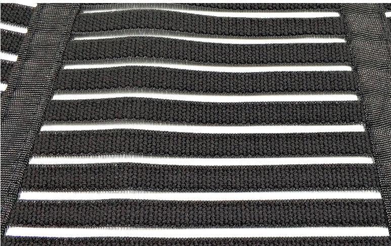 Close-up of black nylon straps woven in horizontal rows on a structured frame, durable webbing design