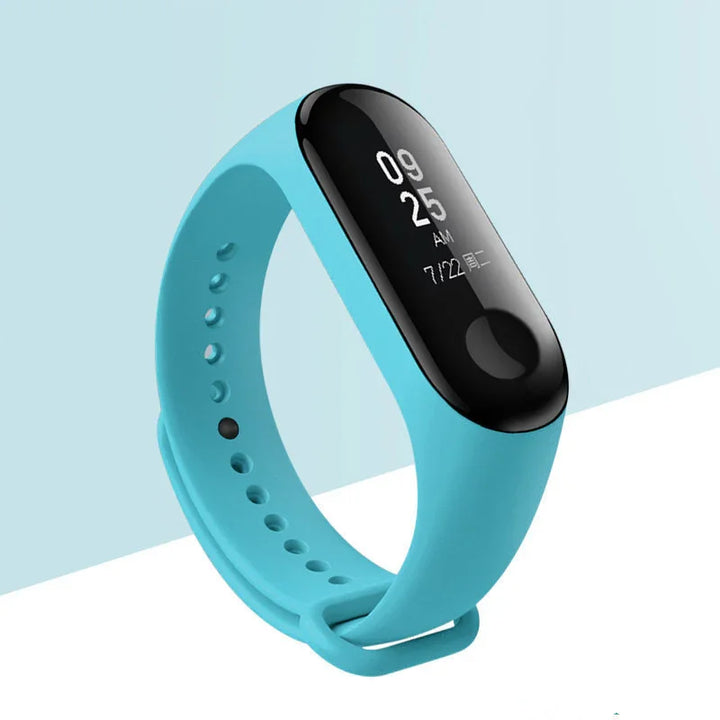 Blue fitness tracker wristband with black digital display showing time and date