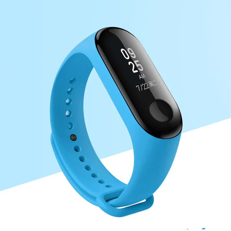 Blue fitness tracker wristband with black digital display showing time and date on light background
