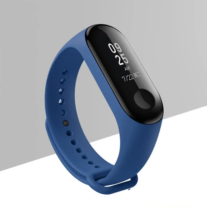 Blue fitness tracker wristband with black screen showing time and date on gray white background