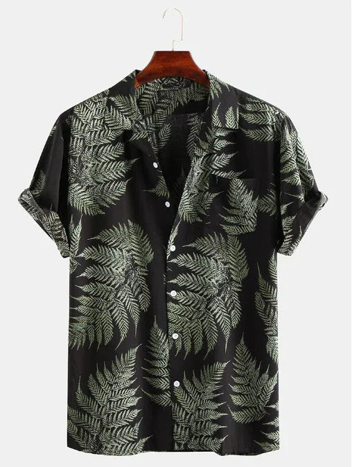 Black short-sleeve button-up shirt with green fern leaf print on wooden hanger