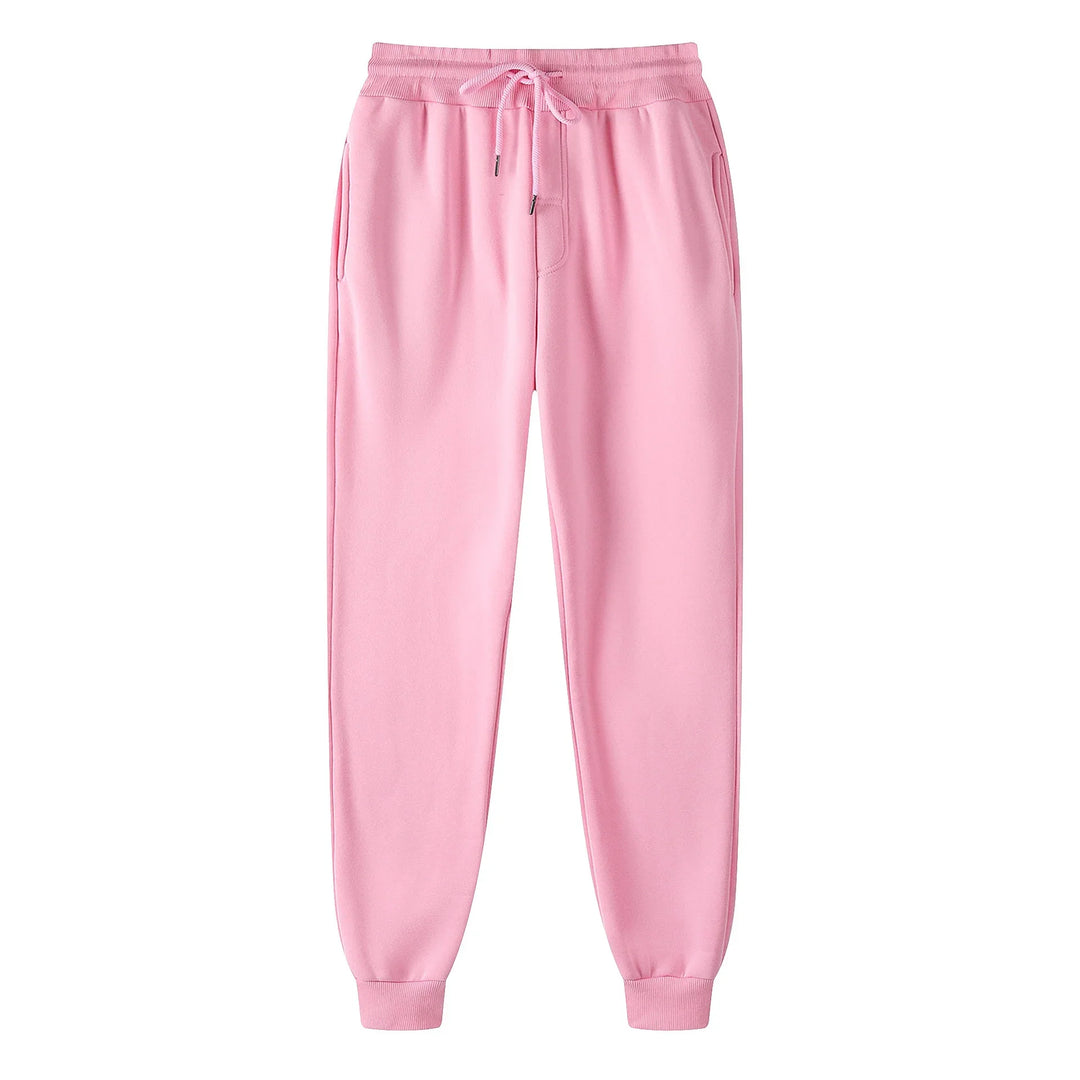 Light pink fleece jogger pants with drawstring waist and cuffed ankles