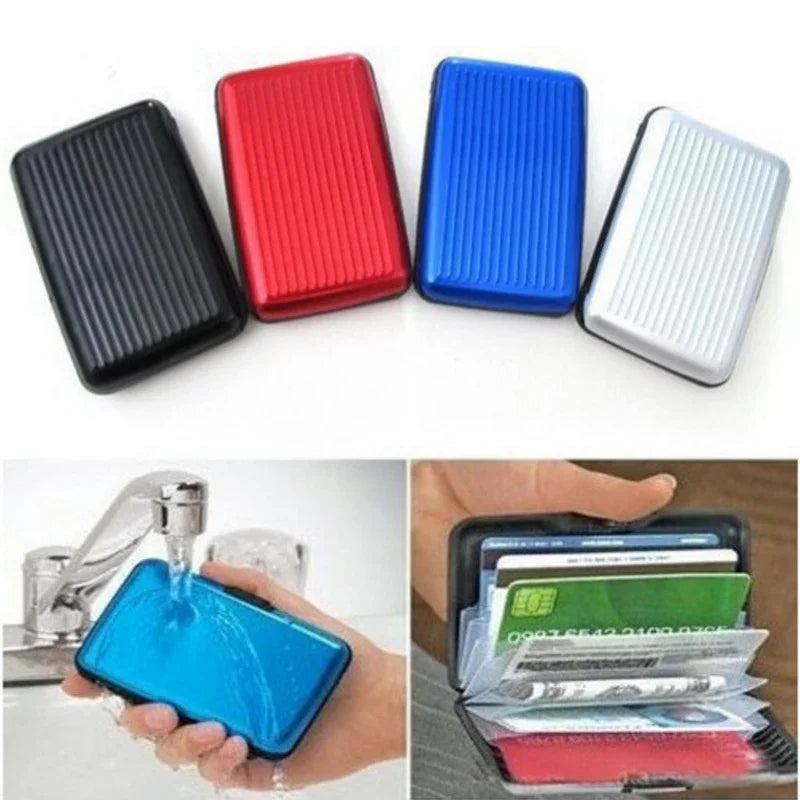 Waterproof aluminum card holder wallet in black, red, blue, and silver with ribbed design, showing water resistance and card storage