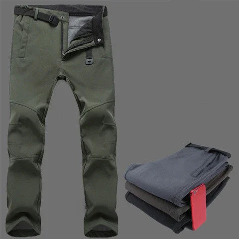 Outdoor hiking pants in olive green with adjustable waist and reinforced knees, folded pants stack with red tag