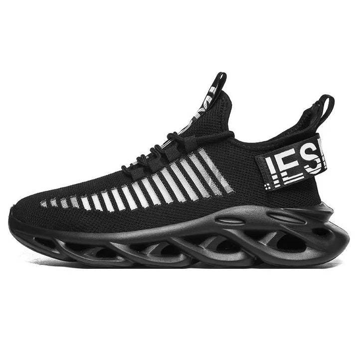 Black athletic sneaker with striped knit upper and futuristic ventilated sole design