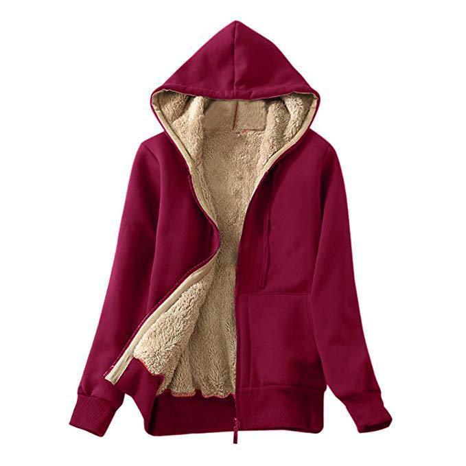 Red zip-up hoodie with beige fleece lining, front pockets, and hood against white background