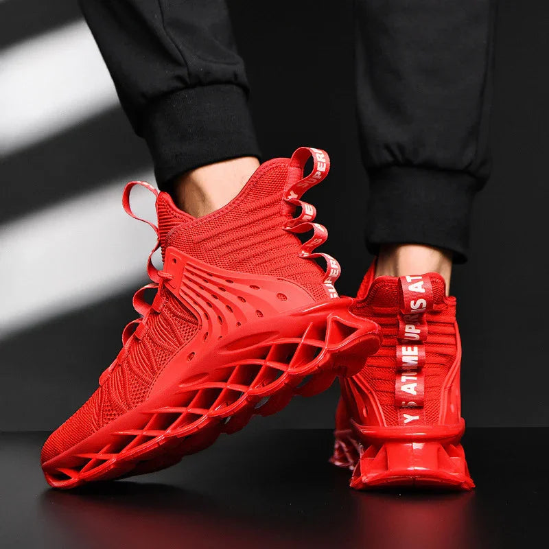 Red high-top athletic sneakers with mesh upper and unique lattice sole worn with black pants