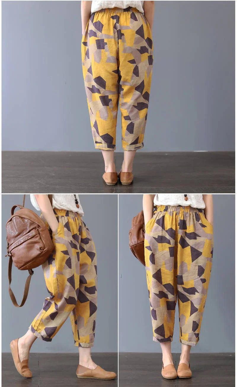 Woman wearing loose fit yellow and brown geometric print casual cropped pants with elastic waist and tan flats