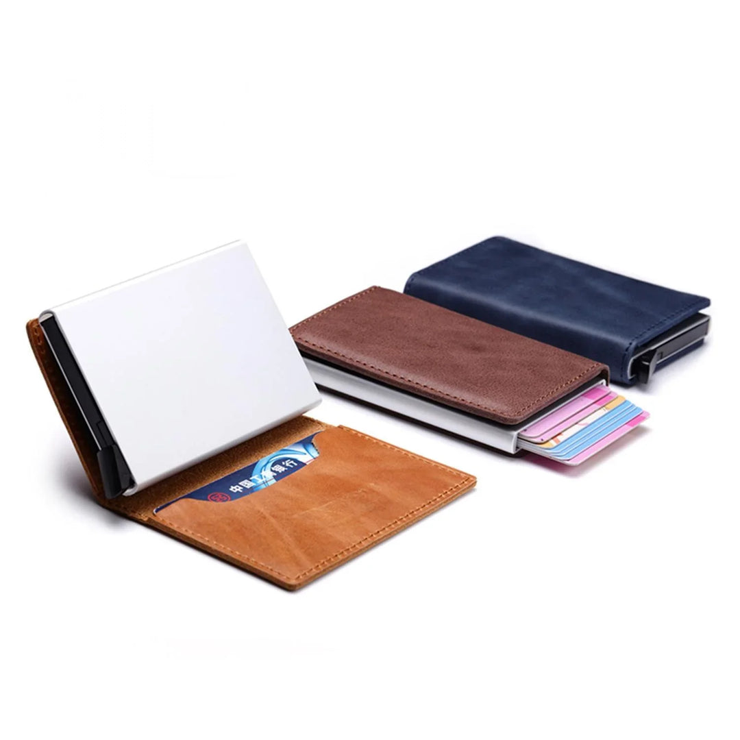 Minimalist leather card holders in brown, navy, and tan with integrated card storage and slots