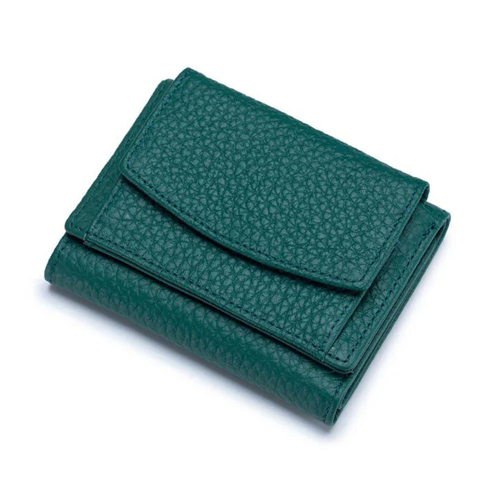 Green textured leather trifold wallet with flap pocket on white background