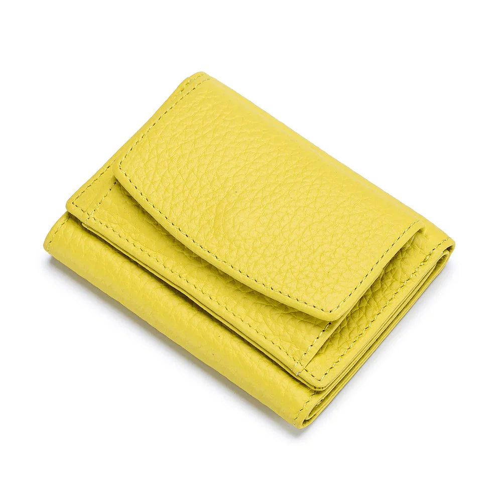 Yellow textured leather folded wallet on white background