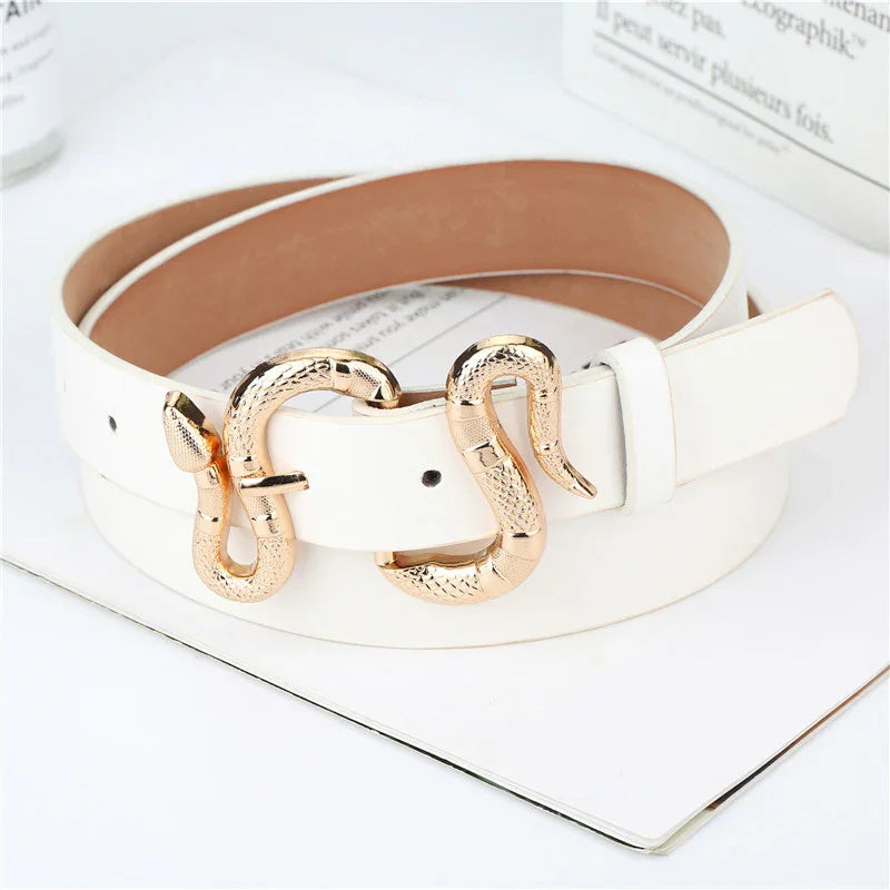 White leather belt with gold snake-shaped buckle on white surface with text background