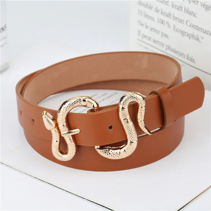 Brown leather belt with gold snake-shaped buckle on white surface