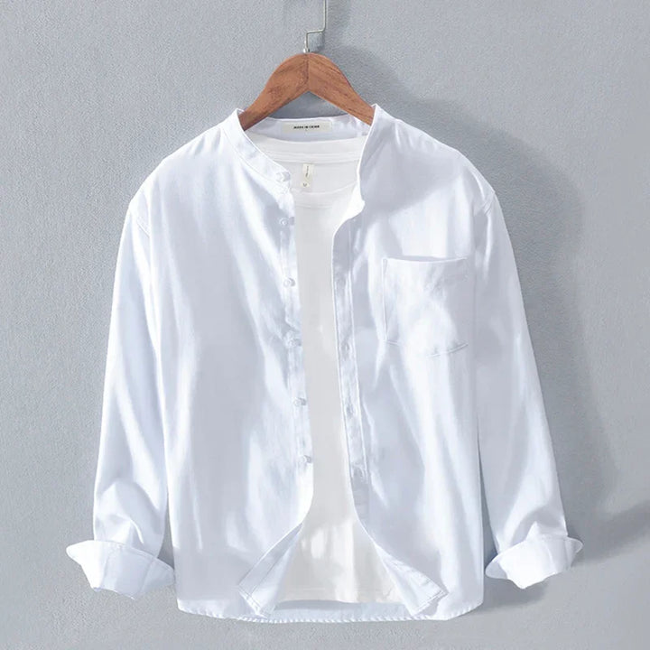 White casual long-sleeve button-up shirt with mandarin collar on wooden hanger