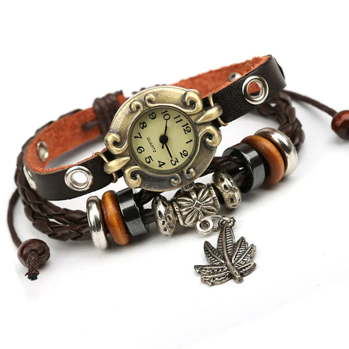 Vintage-inspired quartz wristwatch with leather strap, braided design, beads, and leaf charm
