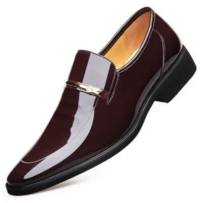 Men's glossy dark burgundy leather loafer with black sole and metal buckle detail