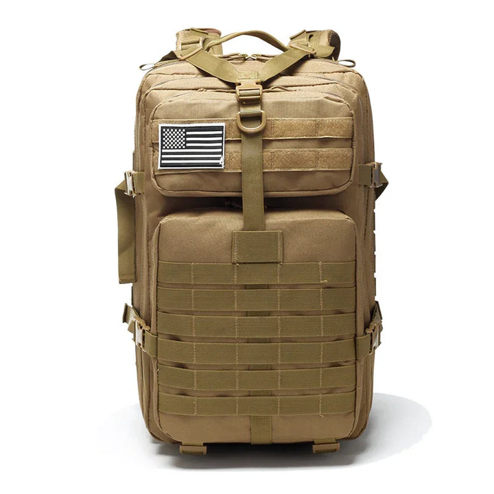 Tan tactical backpack with MOLLE webbing and American flag patch, isolated on white
